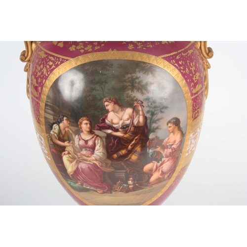 72 - AN IMPRESSIVE 19TH CENTURY VIENNA STYLE PORCELAIN HALL VASE the pedestal ovoid body with gilt mask-h... 