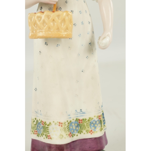 74 - A LATE 19TH CENTURY GARDENER IMPERIAL RUSSIAN PORCELAIN FIGURE depicting a fruit picker with basket ... 