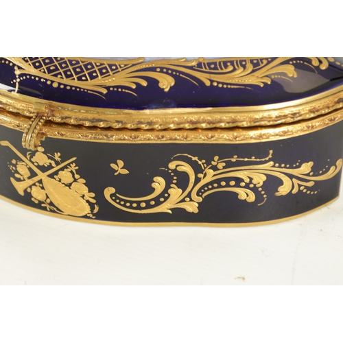 75 - A LATE 19TH CENTURY FRENCH SEVRES PORCELAIN AND GILT BRASS BOX in cobalt blue with gilt decoration, ... 