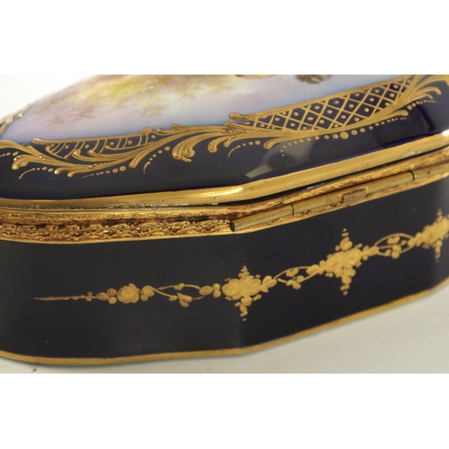 75 - A LATE 19TH CENTURY FRENCH SEVRES PORCELAIN AND GILT BRASS BOX in cobalt blue with gilt decoration, ... 