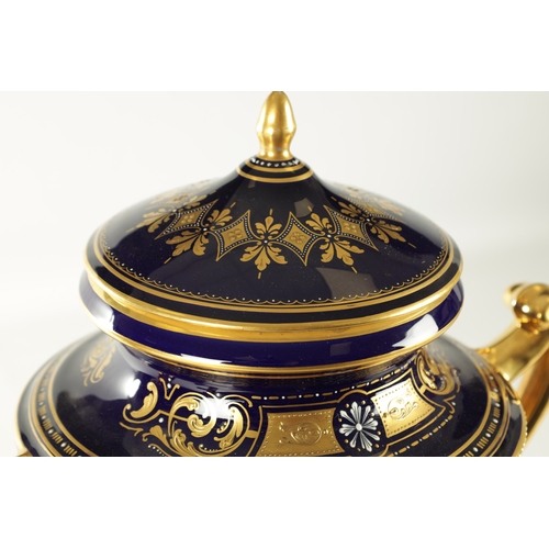 76 - A LARGE ROYAL VIENNA PORCELAIN LIDDED TWO-HANDLED VASE the Royal blue ground with gilt decoration an... 