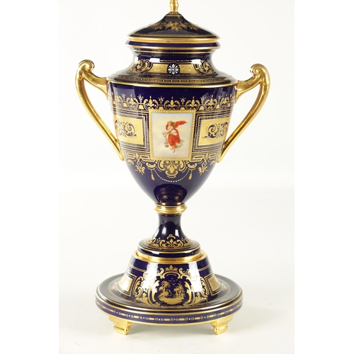 76 - A LARGE ROYAL VIENNA PORCELAIN LIDDED TWO-HANDLED VASE the Royal blue ground with gilt decoration an... 