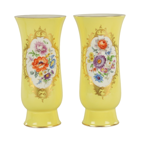 78 - A LARGE PAIR OF 19TH CENTURY MEISSEN PORCELAIN VASES on yellow ground having gilt edged panels of ha... 