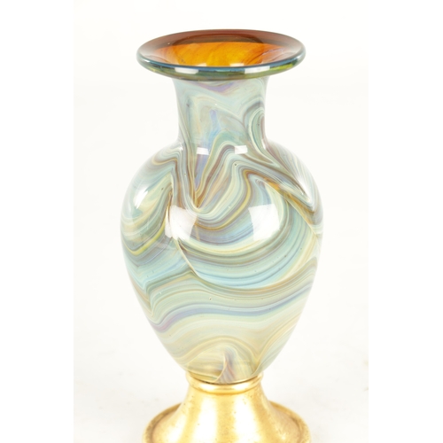 8 - AN EARLY VENETIAN CALCEDONIO COLOURED GLASS VASE mounted on a later gilt metal base (23cm high )