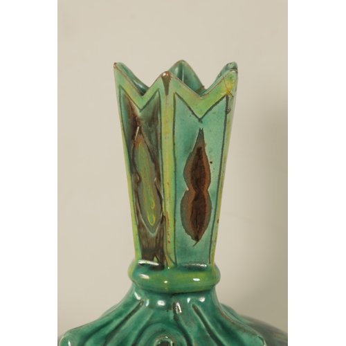 82 - A DELLA ROBBIA ART POTTERY BULBOUS CABINET VASE with leaf work shoulder and spiked neck, painted wit... 