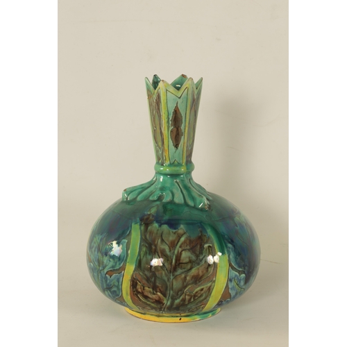 82 - A DELLA ROBBIA ART POTTERY BULBOUS CABINET VASE with leaf work shoulder and spiked neck, painted wit... 