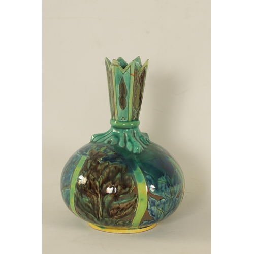 82 - A DELLA ROBBIA ART POTTERY BULBOUS CABINET VASE with leaf work shoulder and spiked neck, painted wit... 