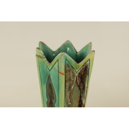 82 - A DELLA ROBBIA ART POTTERY BULBOUS CABINET VASE with leaf work shoulder and spiked neck, painted wit... 