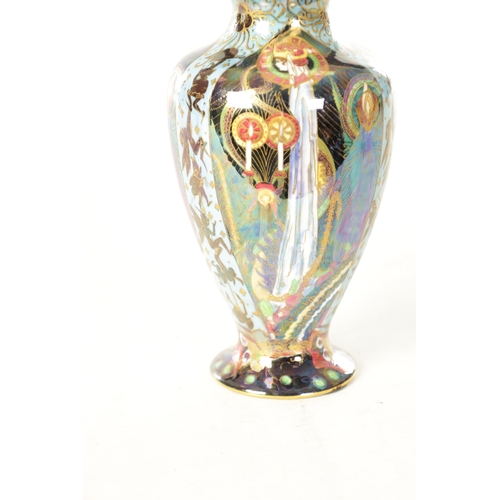 93 - A GOOD EARLY 20TH CENTURY WEDGWOOD FAIRYLAND LUSTRE “CANDLEMAS” DESIGN CABINET VASE BY DAISY MAKEIG ... 