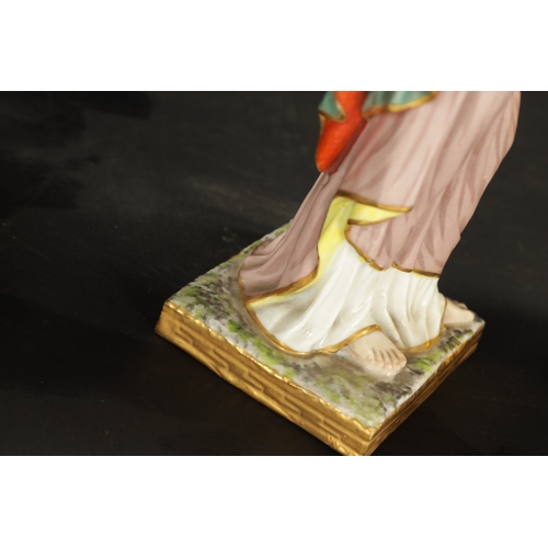 97 - A SET OF FOUR DRESDEN CLASSICAL MAIDEN FIGURES brightly coloured and stamped beneath. (24cm high and... 