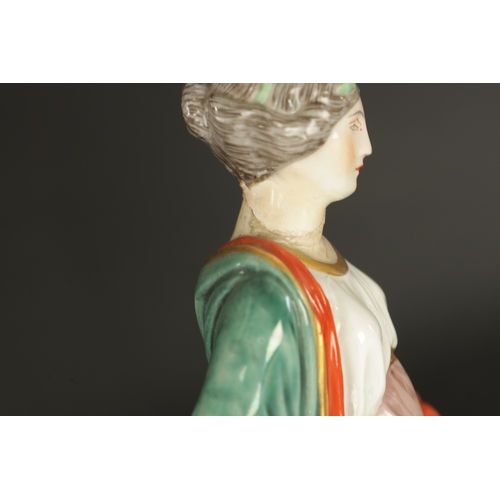 97 - A SET OF FOUR DRESDEN CLASSICAL MAIDEN FIGURES brightly coloured and stamped beneath. (24cm high and... 