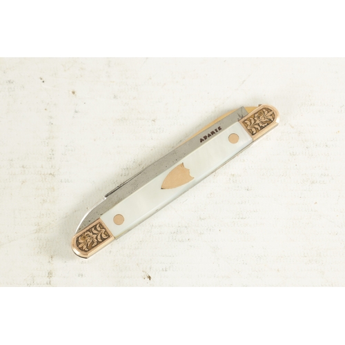 523 - A 19TH CENTURY FRENCH MOTHER OF PEARL AND ROSE GOLD MOUNTED FOLDING POCKET KNIFE with fine floral en... 