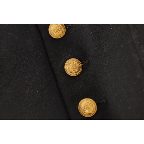 526 - A JAPANESE NAVAL OFFICER'S TAILCOAT with gilt brass buttons and embroidered collar.