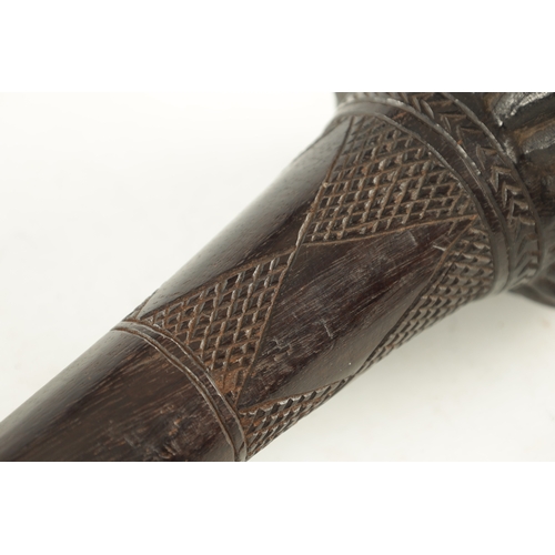 533 - A 19TH CENTURY FIJIAN CLUB with a carved bulbous head and chequer-carved decorated neck (48cm overal... 