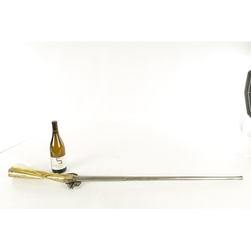 536 - AN UNUSUAL LATE 18TH CENTURY FLINTLOCK SPORTING GUN WITH BRASS STOCK having a 34