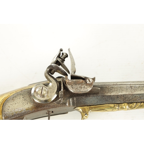 536 - AN UNUSUAL LATE 18TH CENTURY FLINTLOCK SPORTING GUN WITH BRASS STOCK having a 34