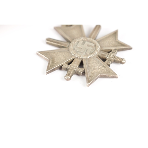 538 - A GERMAN WW2 SILVER KNIGHT'S CROSS OF THE WAR - MERIT CROSS WITH SWORDS ribbon mounted, marked 