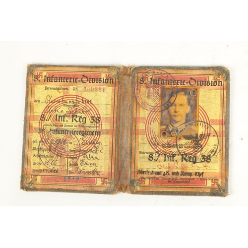 551 - A COLLECTION OF FIVE WW2 GERMAN IDENTIFICATION DOCUMENTS comprising, ID cards, Passports and a membe... 