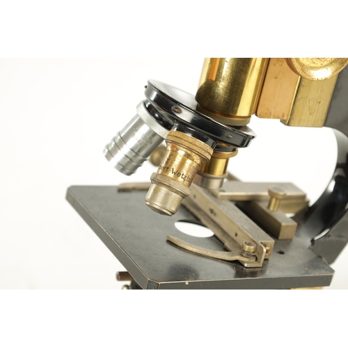 560 - A 20TH CENTURY E. LEITZ WETZLAR MONOCULAR MICROSCOPE NUMBER 190500 the brass and blackened frame of ... 