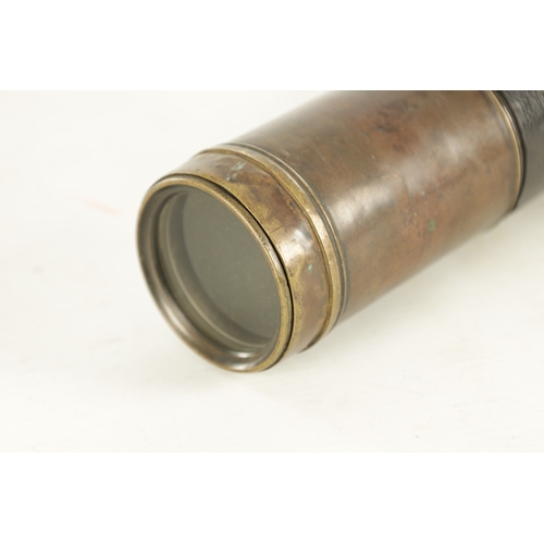 563 - A 19TH CENTURY LEATHER BAND SINGLE DRAW BRASS OFFICER'S TELESCOPE with extending lens shade and indi... 