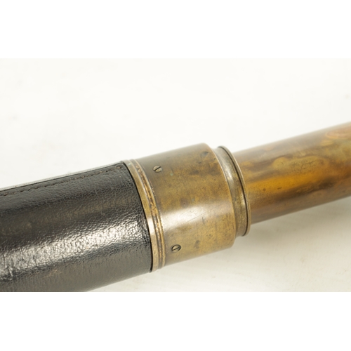 563 - A 19TH CENTURY LEATHER BAND SINGLE DRAW BRASS OFFICER'S TELESCOPE with extending lens shade and indi... 