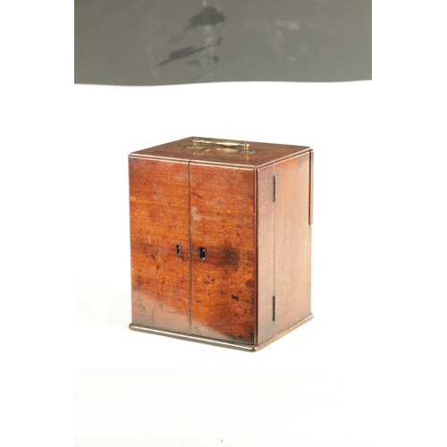 565 - A GEORGE III MAHOGANY APOTHECARY BOX with a hinged front revealing a medicine bottle and two fitted ... 