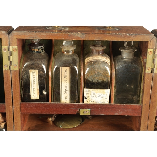 565 - A GEORGE III MAHOGANY APOTHECARY BOX with a hinged front revealing a medicine bottle and two fitted ... 