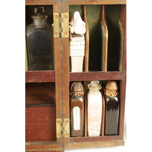 565 - A GEORGE III MAHOGANY APOTHECARY BOX with a hinged front revealing a medicine bottle and two fitted ... 