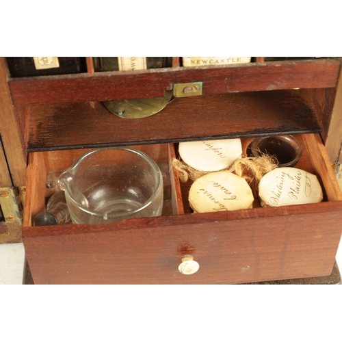 565 - A GEORGE III MAHOGANY APOTHECARY BOX with a hinged front revealing a medicine bottle and two fitted ... 