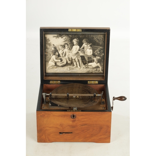 569 - A LATE 19TH CENTURY SYMPHONION MUSIC BOX the walnut case with inlaid lid opening to reveal a 7 1/2