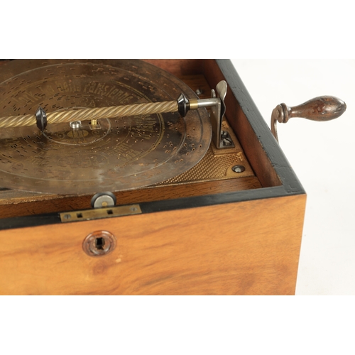 569 - A LATE 19TH CENTURY SYMPHONION MUSIC BOX the walnut case with inlaid lid opening to reveal a 7 1/2