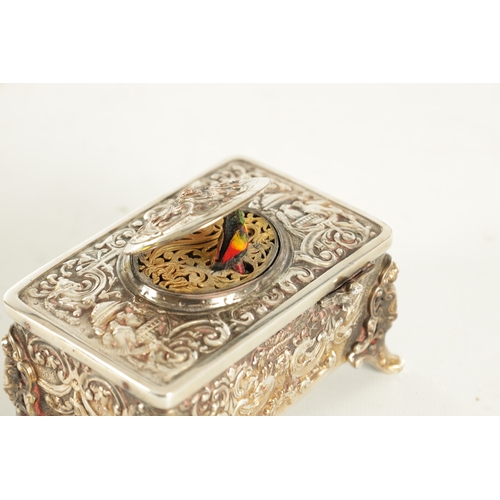 574 - AN EARLY 20TH CENTURY GERMAN SINGING AUTOMATION BIRD BOX the silvered metal case with scrollwork emb... 