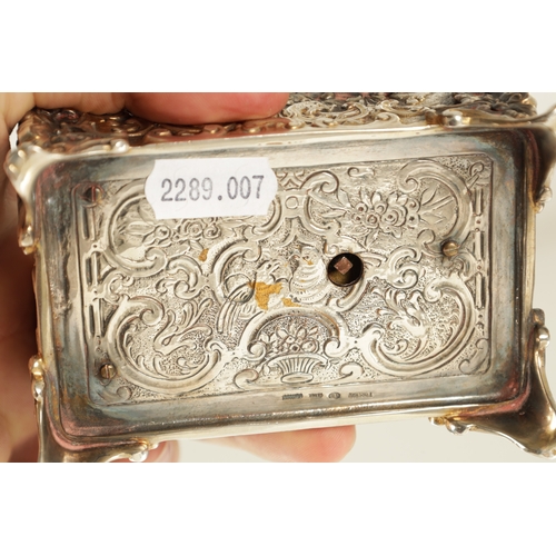 574 - AN EARLY 20TH CENTURY GERMAN SINGING AUTOMATION BIRD BOX the silvered metal case with scrollwork emb... 