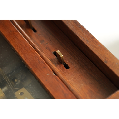 575 - A 19TH CENTURY SWISS MUSIC BOX having walnut case enclosing an early music box playing six airs bear... 