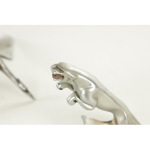 590 - A COLLECTION OF THREE VINTAGE CAR MASCOTS comprising of a prancing jaguar, a flying stork and a Pega... 