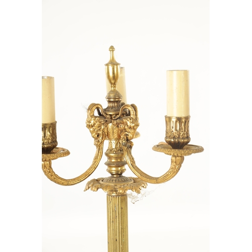 599 - A PAIR OF LATE 19TH CENTURY FRENCH ORMOLU AND WHITE MARBLE THREE BRANCH CANDELABRA with ram's head m... 