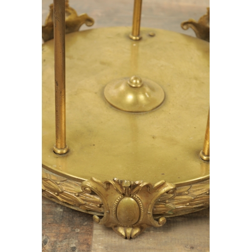 604 - A LARGE PAIR OF EDWARDIAN GILT BRASS HANGING LANTERNS with shaped tops and pineapple finials each ha... 