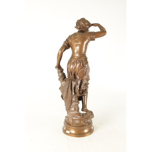 614 - EUGENE MARIOTON (1854-1933) A 19TH CENTURY FRENCH BRONZE SCULPTURE depicting a working girl looking ... 