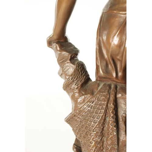 614 - EUGENE MARIOTON (1854-1933) A 19TH CENTURY FRENCH BRONZE SCULPTURE depicting a working girl looking ... 