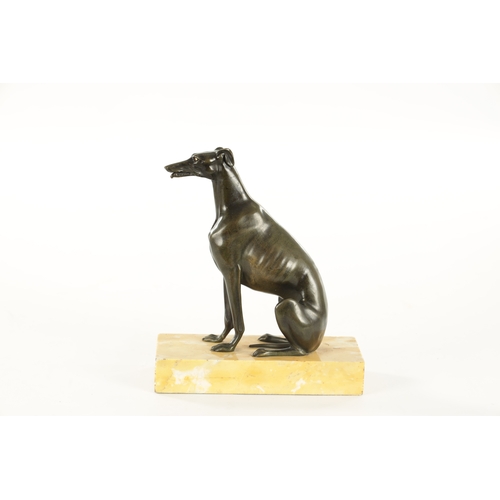 617 - A REGENCY PATINATED BRONZE DESK TIDY FORMED AS A SEATED GREY HOUND with a sprung mouth for paper rai... 