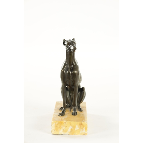 617 - A REGENCY PATINATED BRONZE DESK TIDY FORMED AS A SEATED GREY HOUND with a sprung mouth for paper rai... 