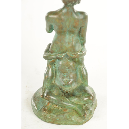 620 - A 20TH CENTURY FRENCH GREEN-PATINATED EROTIC BRONZE SCULPTURE depicting lovers (24.5cm high)