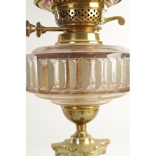 622 - A VICTORIAN SQUARE-BASE BRASS OIL LAMP with Corinthian column stem, etched cut glass clear reservoir... 