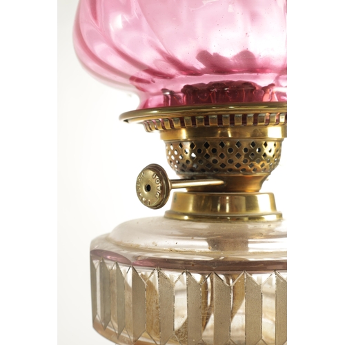 622 - A VICTORIAN SQUARE-BASE BRASS OIL LAMP with Corinthian column stem, etched cut glass clear reservoir... 