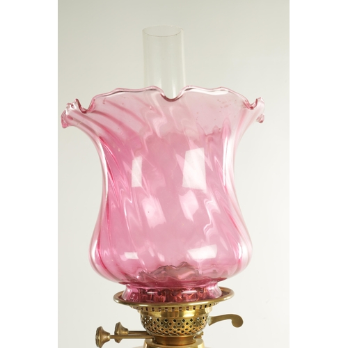 622 - A VICTORIAN SQUARE-BASE BRASS OIL LAMP with Corinthian column stem, etched cut glass clear reservoir... 