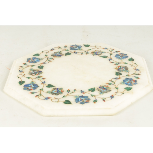 624 - A WHITE MARBLE PIETRA DURA OCTAGONAL-SHAPED TABLE TOP inset with a floral band having precious stone... 