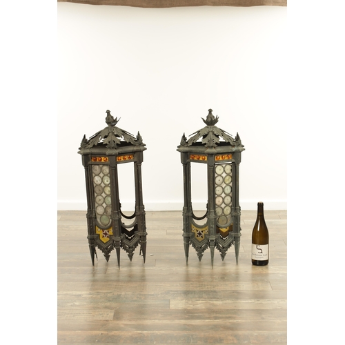 642 - A PAIR OF LATE 19TH CENTURY BRONZE GOTHIC STYLE HANGING LANTERNS the hexagonal shaped bodies with sp... 