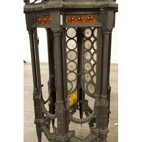 642 - A PAIR OF LATE 19TH CENTURY BRONZE GOTHIC STYLE HANGING LANTERNS the hexagonal shaped bodies with sp... 