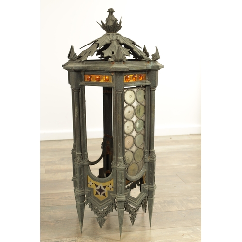 642 - A PAIR OF LATE 19TH CENTURY BRONZE GOTHIC STYLE HANGING LANTERNS the hexagonal shaped bodies with sp... 