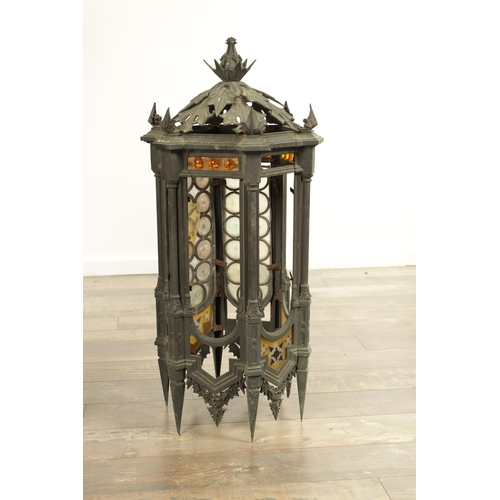 642 - A PAIR OF LATE 19TH CENTURY BRONZE GOTHIC STYLE HANGING LANTERNS the hexagonal shaped bodies with sp... 